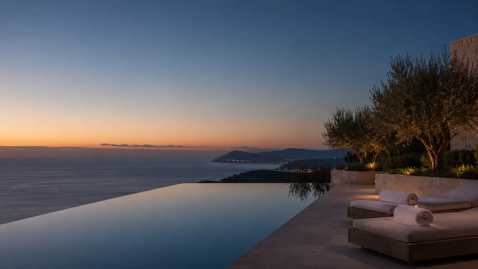 A clear infinity pool overlooking the Mallorcan coast.
